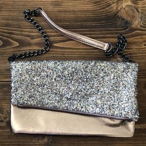 EXPRESS rose gold glittery clutch with strap